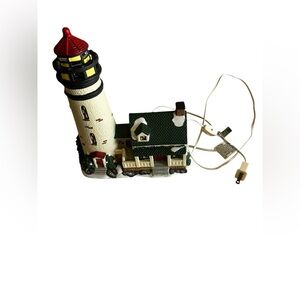 HOLYDAY TIME 10 /1/2 H LIGHTHOUSE CHRISTMAS VILLAGE FROM WALMART